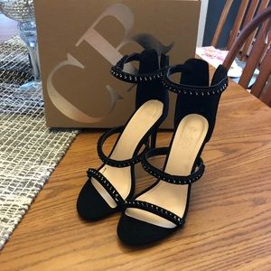*BRAND NEW, NEVER WORN* black with gold heels!